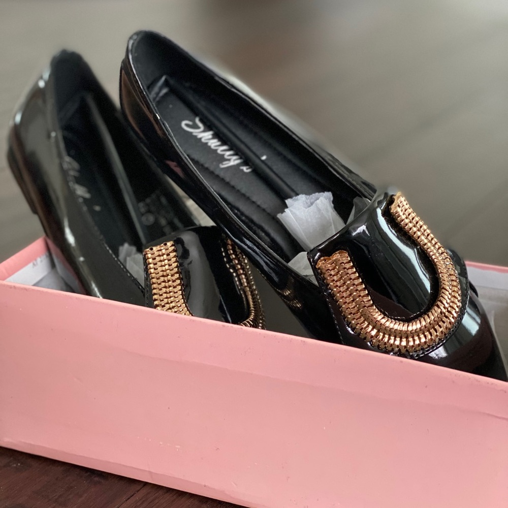Black and gold flats